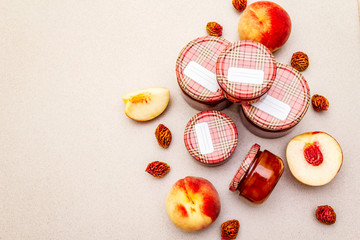 White peach jam, confiture, chutney in a glass jar