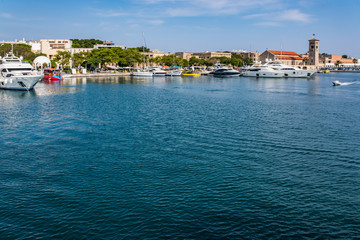 Fototapeta na wymiar Views of the island of Rhodes while walking on a ship on the Aegean Sea.