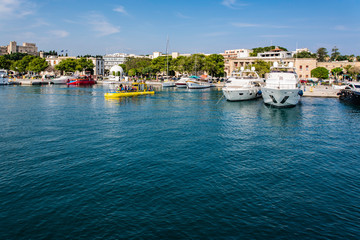 Views of the island of Rhodes while walking on a ship on the Aegean Sea.