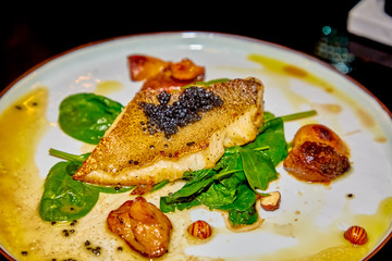 Fried fish with potatoes and caviar
