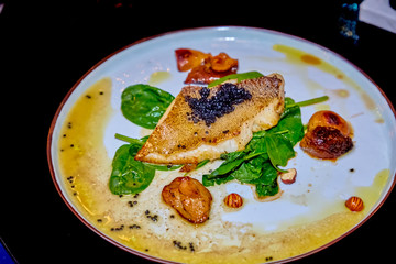 Fried fish with potatoes and caviar