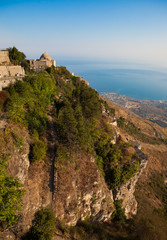 Dramatic hillside with historic church in Eurice, Sicily