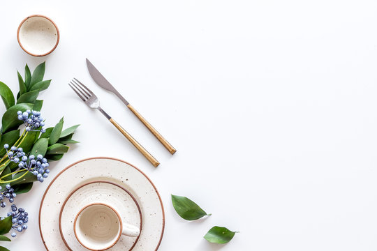 White Plates And Flowers For Table Setting On White Background Top View Mockup