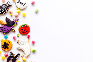 Fototapeta na wymiar Halloween decorations frame on white background top view copyspace
