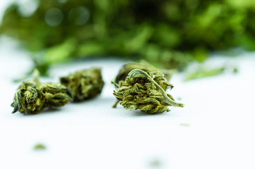 Fototapeta na wymiar Macro photo of a large pile of buds and marijuana leaves
