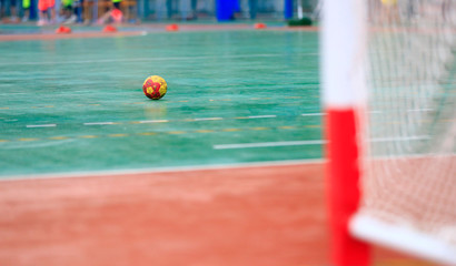 A handball on the playing field