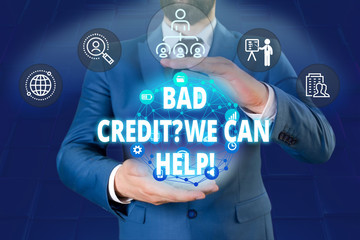 Writing note showing Bad Credit Question We Can Help. Business concept for offering help after going for loan then rejected Male human wear formal work suit presenting using smart device