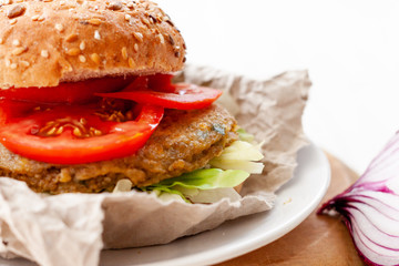 quinoa vegetable burger with tomato 