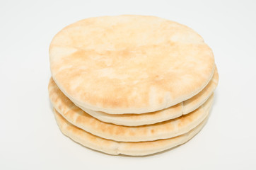Pita flat bread isolated on white background