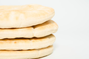 Pita flat bread isolated on white background