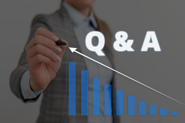 Handwriting text Q And A. Conceptual photo defined as questions being asked and answers Woman wear formal work suit presenting presentation using smart device