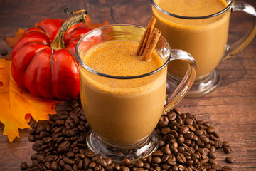 A Pumpkin Spice Latte on a Rustic Wooden Table