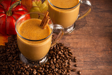 A Pumpkin Spice Latte on a Rustic Wooden Table