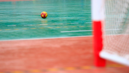 A handball on the playing field