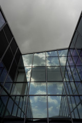 dark clouds above the patio of an office building