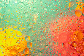 Oil drops in water abstract psychedelic pattern image. Abstract background with colorful gradient colors.