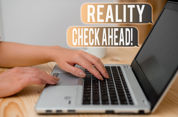 Word writing text Reality Check Ahead. Business photo showcasing makes them recognize truth about situations or difficulties woman laptop computer smartphone mug office supplies technological devices