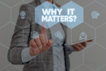Conceptual hand writing showing Why It Matters question. Concept meaning ask demonstrating about something he think is important Woman wear work suit presenting presentation smart device
