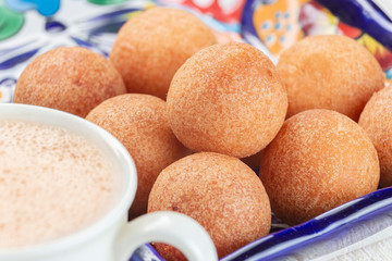 Fritters on the table, typical Colombian food, close-up image