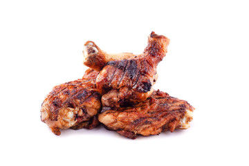 Grilled chicken leg on white background.
