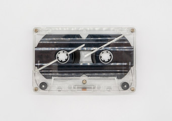 Clear plastic casette tape isolated on white background.