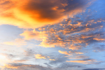 Dramatic sky sunset or sunrise colorful red and orange sky over cloud beautiful multicolor fiery background