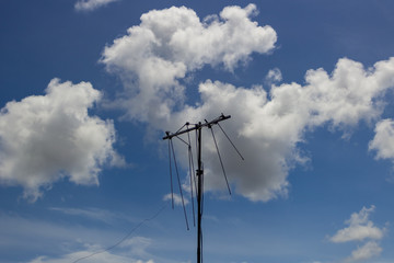 wind power turbine against blue sky