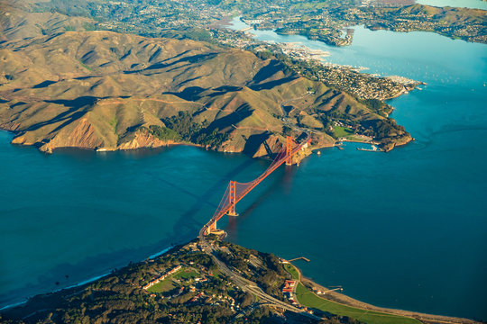 Aerial view of the Golden Gate Bridge in San Francisco with Sausalito in the background - Powered by Adobe