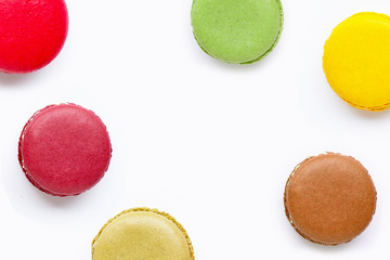 Colorful macarons isolated on white