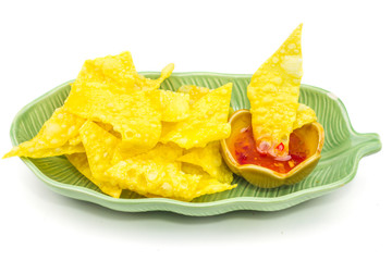dumpling fried with sauce on white plate, Thai food in thailand isolated over white background.