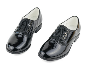 Two fashionable black women's shoes isolated on white background.