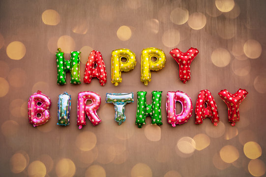 Happy Birthday Alphabet Text On Wall Background.