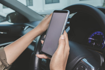 Close up woman hand using smart phone.Technology concept.