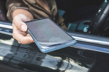 Close up woman hand using smart phone.Technology concept.