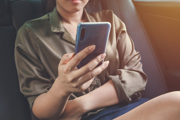 Close up woman hand using smart phone.Technology concept.