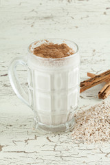 tasty and healthy oatmeal smoothie with cinnamon