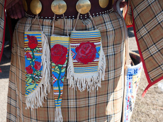 Three Beaded Pouches Worn by Native American Woman