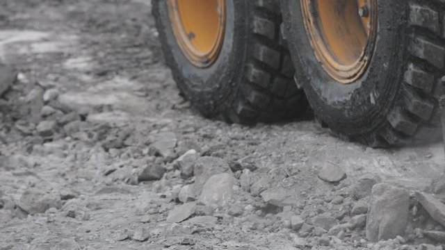 Closeup grader lines the road. Open pit coal mining