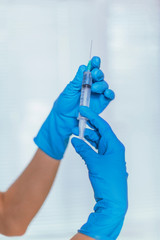 Injection, syringe in hand