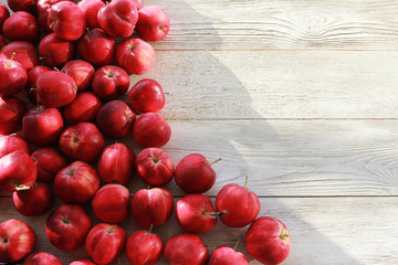 Red apples on white wooden boards or desk, Back ground, copy space, top view. Autumn, fall, harvest, apple picking concept