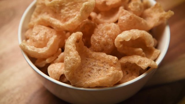 White Bowl of Fried chicharrones (pork rind)
