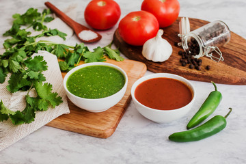 mexican red and green sauces, spicy hot chili sauce made with chilli pepper, garlic and tomatoes, food in Mexico city