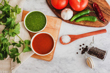 mexican red and green sauces, spicy hot chili sauce made with chilli pepper, garlic and tomatoes, food in Mexico city