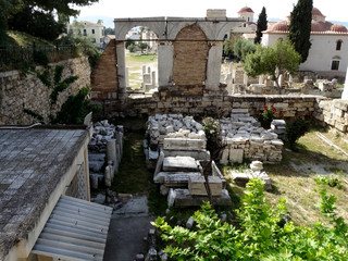 Ruins of Roman Agora complex in Athens city in Greece. The Roman Agora was encroached and obstructed by Roman buildings, and is known to have been a peristyle open space. 