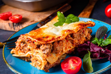 spicy lasagne with tomato sauce and basil