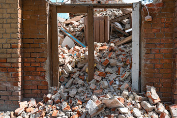 window in ruined building. consequences airstrike