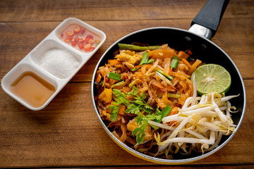 Pad Thai , Thai style noodles , Pad Thai on the table, top view, copy space