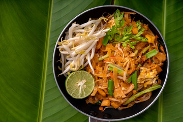 Pad Thai , Thai style noodles , Pad Thai on the table, top view, copy space © คุณ ศรัญ