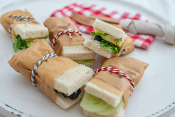 Healthy home made sandwich with avocado, salad and ham