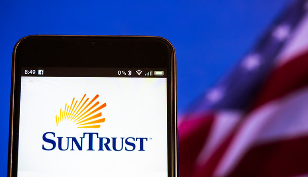 Kiev, Ukraine, September 4, 2018, illustrative editorial. SunTrust Banks, Inc. logo on a smart phone